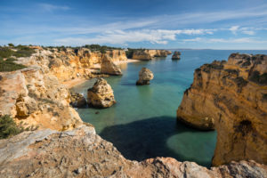 Rocky coast at Praia da Marinha near Benagil, Algarve, Faro district, Portugal Rocky coast at Praia da Marinha near Benagil, Algarve, Faro district, Portugal